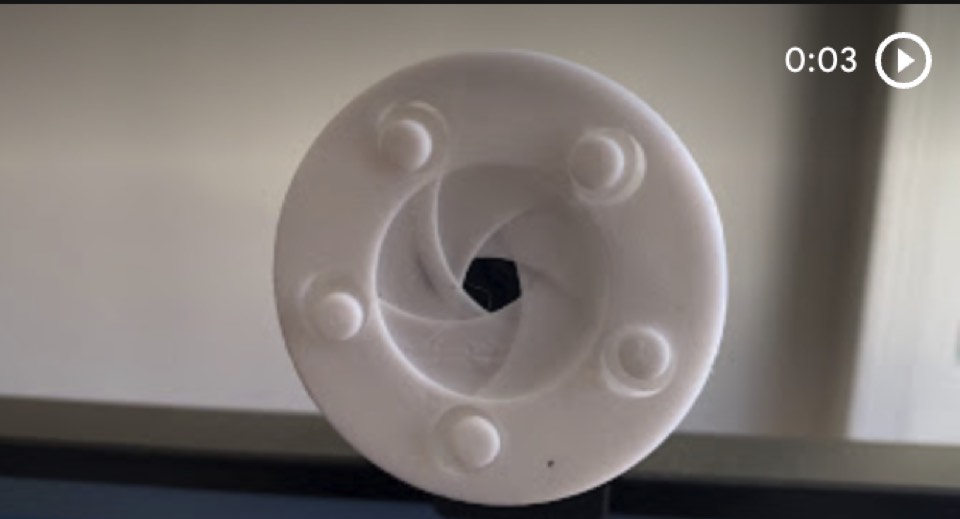 3D-Printed Iris Webcam Cover cover