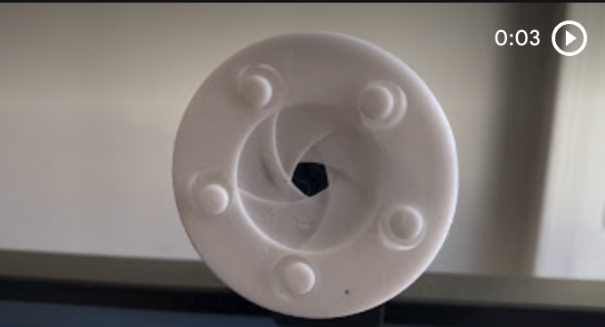 3D-Printed Iris Webcam Cover image 3